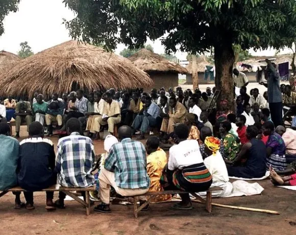 community gathering waiting onto their grants.