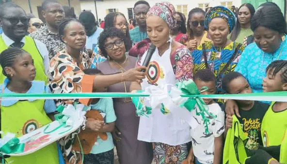 Olori Atuwatse III addressing students at the launch of the 'Love Garden' initiative at Dom Domingos College, Delta State, emphasizing the importance of sustainable farming and youth empowerment. 