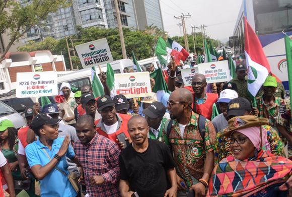 Nigerian workers protesting for fair wages.