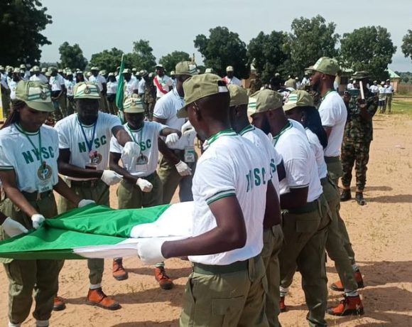 Nigerian NYSC corps members during a swearing-in ceremony at an orientation camp.