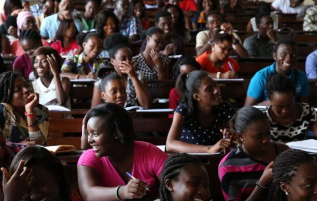  Nigerian students preparing scholarship applications online.
