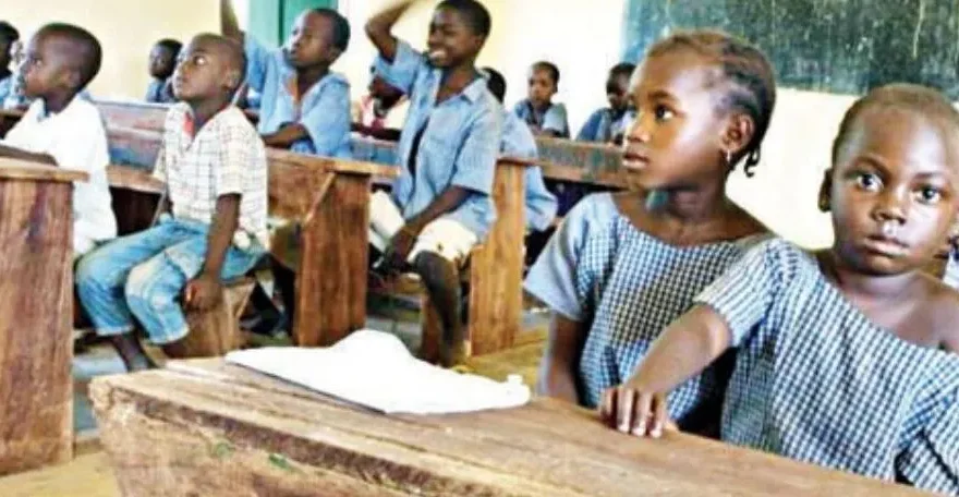 A classroom in Nigeria with children learning, highlighting the importance of improving primary education infrastructure.