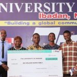 Image of a joyful university student holding books, symbolizing academic success and opportunities through the OPay scholarship.