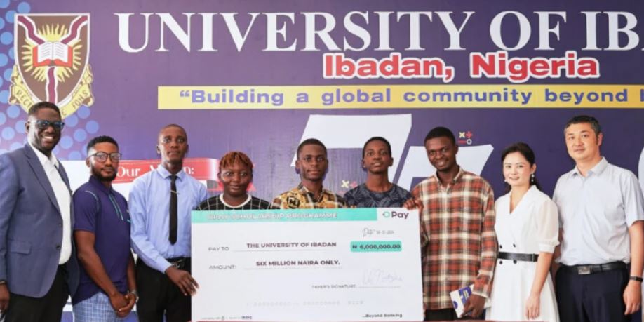 Image of a joyful university student holding books, symbolizing academic success and opportunities through the OPay scholarship.