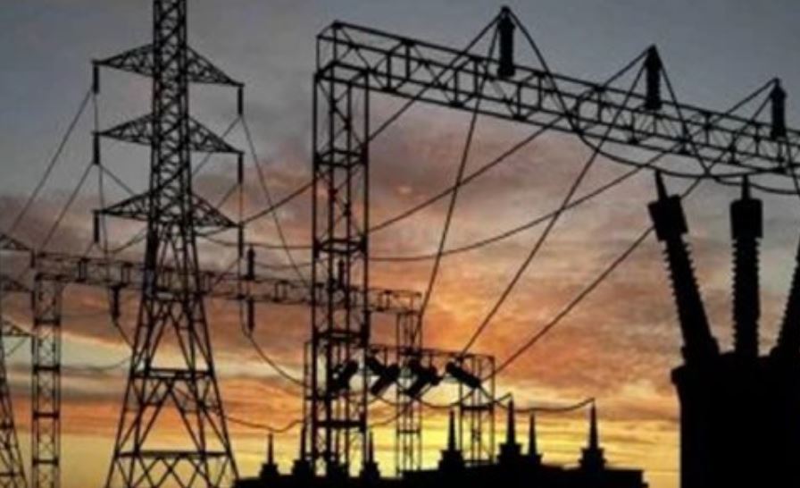 A Nigerian neighborhood in complete darkness during a national power grid outage.