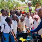 UAC Foods installs solar-powered borehole and awards scholarships in Kerang Community to improve residents' well-being.